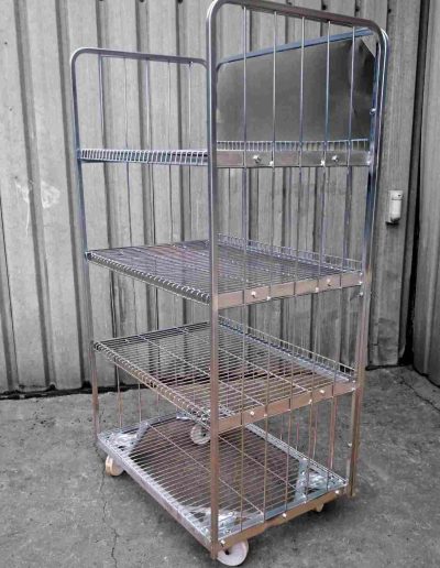 Three-tier egg trolley with improved mesh racks and back panel for stability